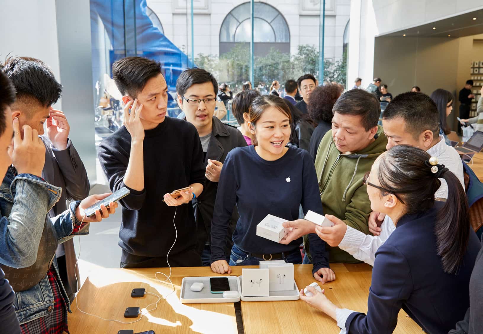 Apple Airpod Pro Launch Shanghai Guests With Team Member At Product Table 10302019